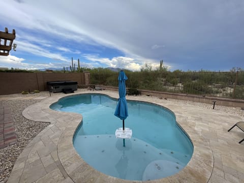 Heated Salt Water Pool with in-pool umbrella.
