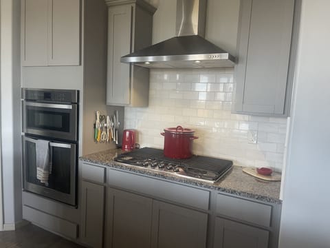 5 burner gas stove top and built in microwave and wall oven