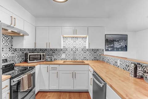 This remodeled kitchen has everything you could ever need to enjoy home cooked meals
