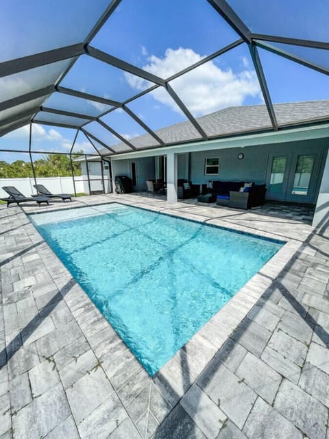 Screened in heated pool deck
