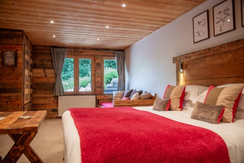 Alpine Suite - The Owl Bedroom with terrace view
