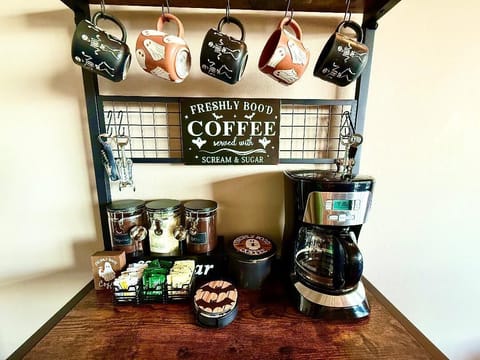 Coffee Bar
Start your day with freshly “boo’d” coffee. Halloween mugs, treats, and décor make every cup feel like a seasonal celebration.