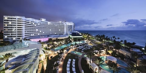 Soak up the glamorous evening glow across the oceanfront resort.