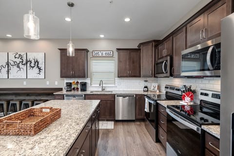 Large kitchen w/2 dishwashers, 2 ovens, 2 microwaves, and refrigerator