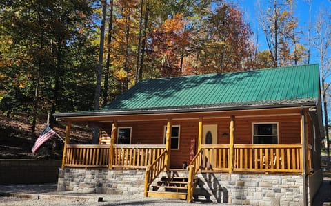 Sugar Bear Cabin has a large parking area, and spacious porch for relaxing.

