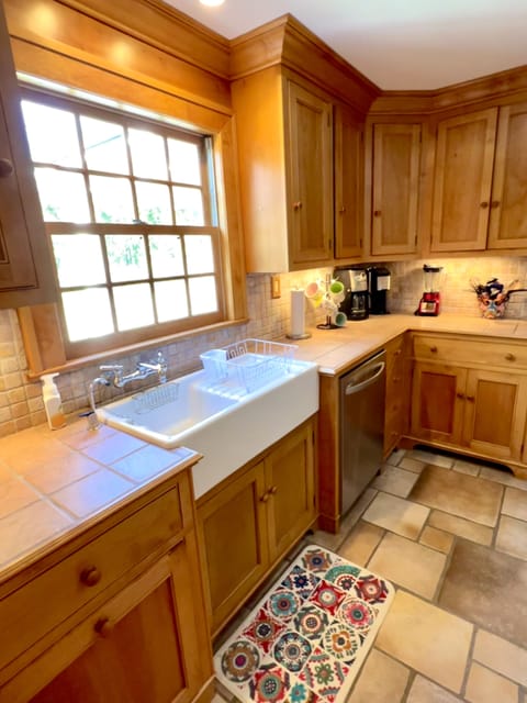 Enjoy washing dishes in the old time sink.  (or just use the quiet dishwasher!)