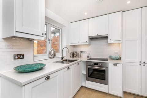 A new kitchen with dishwasher, washer dryer etc 