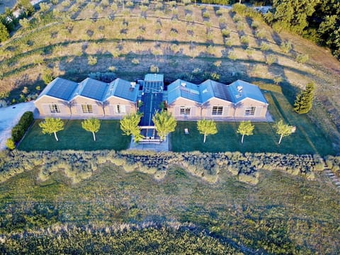 View of the whole house from the west at sunset.