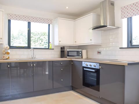 Kitchen area | Hill View Lodge - Mill Farm Holiday Cottages, Heyope, near Knighton