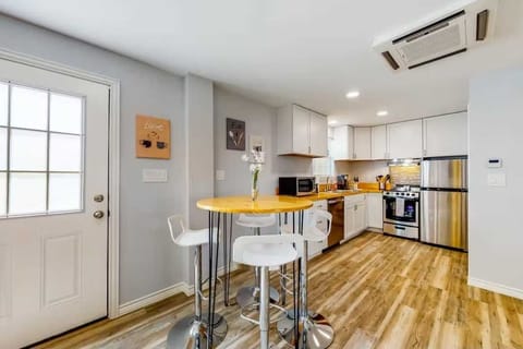 Bar-style seating creates a cozy breakfast nook right next to the kitchen!