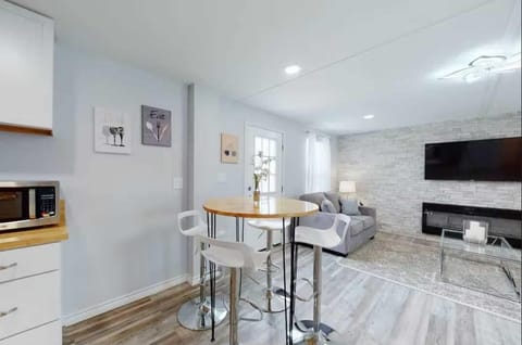 Modern bar-style seating graces the indoor dining area, and there's plenty of space to eat outside, as well!