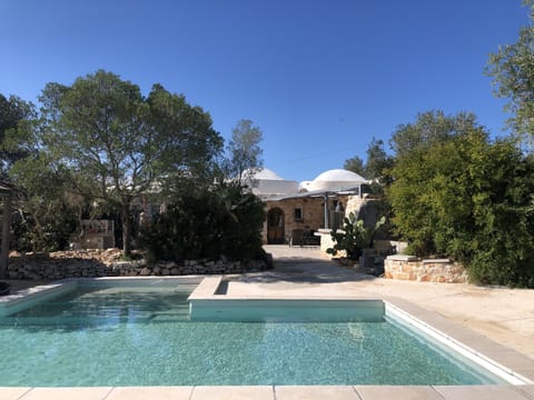 Private swimming pool with shallow area to lounge or learn View towards kitchen