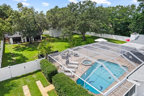 Main house, enclosed pool, large backyard, 2 king suite cottage& activity hangar