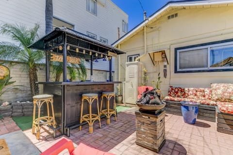 Patio offers tiki bar, gas BBQ, and gas fire pit.  You may use the patio as an extension of your living space. "The available outdoor space is really nice." - Nick (guest)