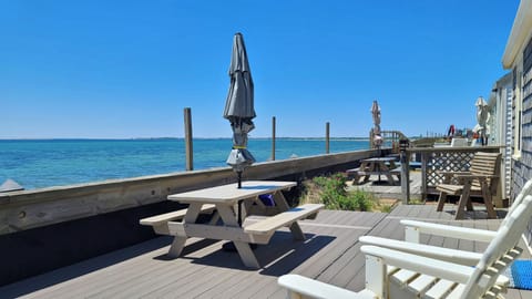 Exclusive-use deck with picnic table, gas grill and Adirondack chairs