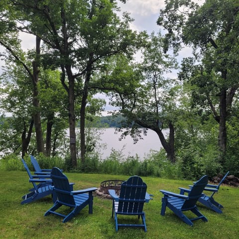 Relax & unwind with a fire while overlooking the lake