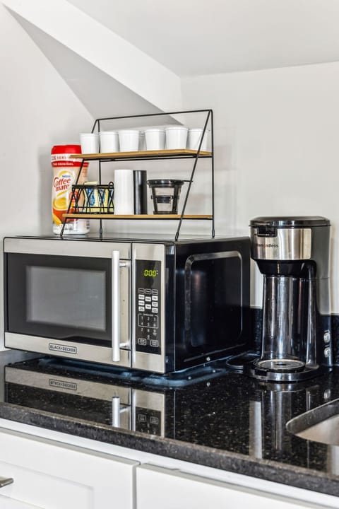 We have a microwave and coffee pot.