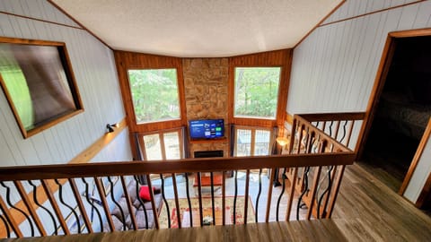 View looking down over part of living room