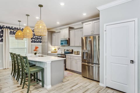 Modern kitchen supplied with what you'll need to cook up family meals