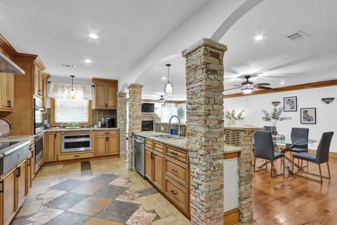 Enjoy seamless living with our open floor plan, where the kitchen and dining room flow together for effortless entertaining and family meals.