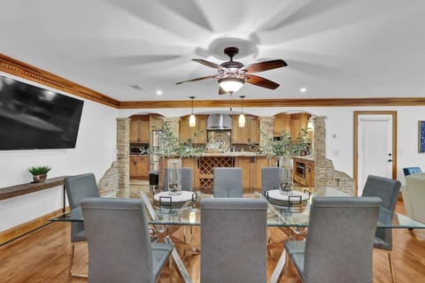 Dining room and kitchen with smart tv for group fun