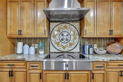 Admire the artistry of our kitchen with stunning tile work that adds a touch of elegance and sophistication to every meal prep.