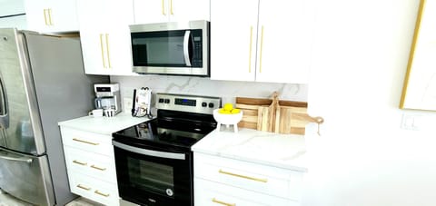 Clean and Fully Equipped Kitchen