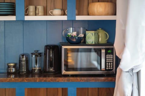 Microwave, cooking spices, olive oil and coffee stocked!