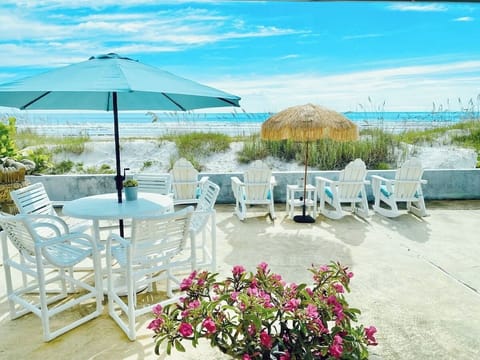 Spacious, ocean facing back porch with plenty of seating and DIRECT BEACH ACCESS