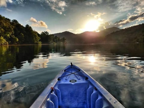 Enjoying the sunset just off of our dock before heading up to snuggle by the fire on the balcony.