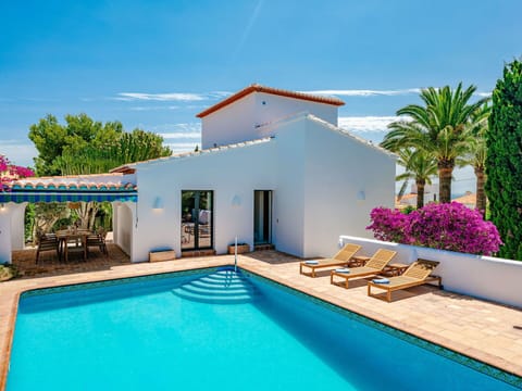 Water, Sky, Plant, Property, Cloud, Swimming Pool, Azure, Building, Outdoor Furniture, Tree