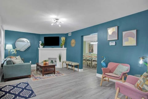 Large living room #1 at the front of the main house equipped with HDTV and cable!