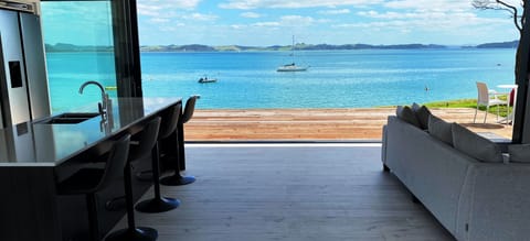 Beachfront with infinity sea views that make you feel you are on the water