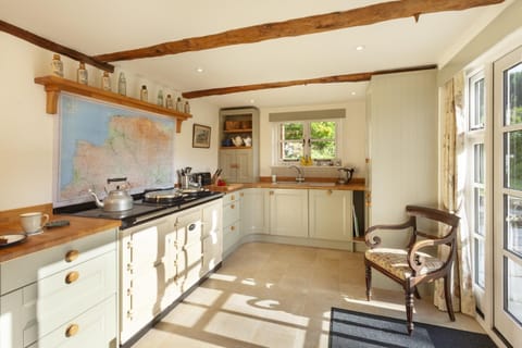 kitchen with electric aga and a exmoor map (and beyond) as your splashback!