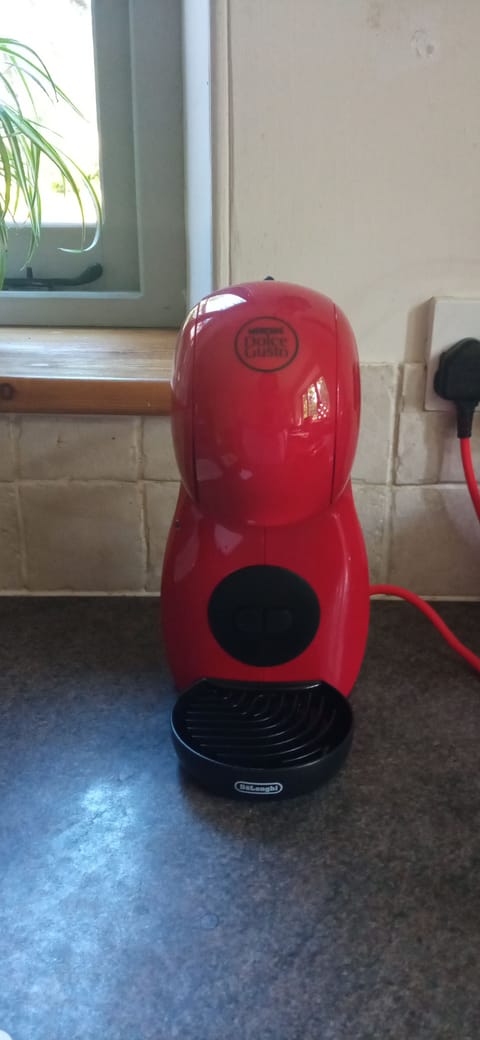 Coffee pod machine - included so you know which brand.