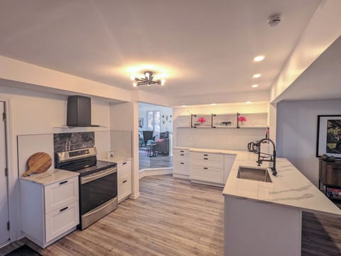 Fully outfitted kitchen with quartz counters