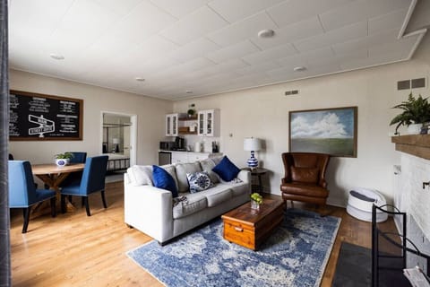 Upon entering you will find the seating and kitchenette area.