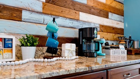 Coffee bar for your all you coffee lovers! Creamers, k-cups, frother, and more!