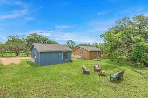 Communal backyard area. Plenty of outdoor furniture and entertainment 