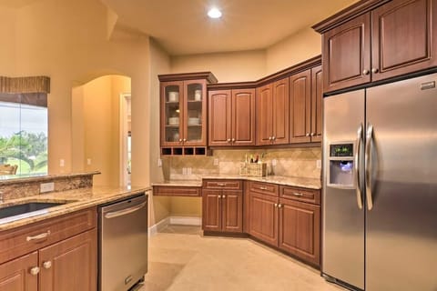 Open kitchen w/ stainless appliaces, stocked with the essentials for meal prep!