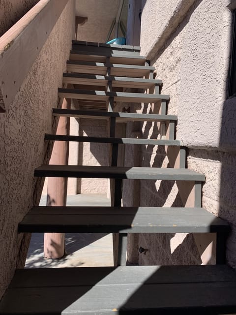 Access to the main living space via one flight of stairs.