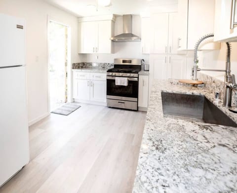 Lots of appliances, 5 burner stove with oven, microwave, coffee maker and more.  Everything you need to create a meal for family or just a quick snack.