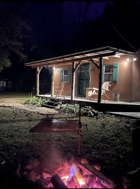 Fire pit for cooking or sitting around.