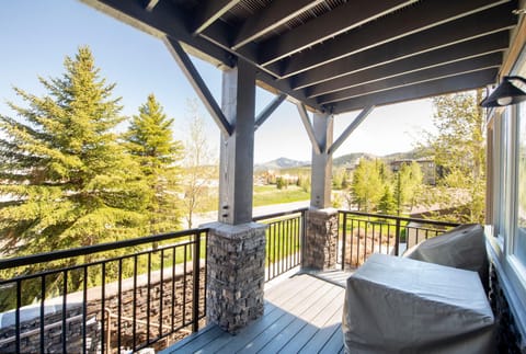 Newly-renovated private deck with mountain views and outdoor dining furniture