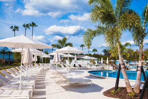 Unwind in comfort with shaded lounge seating, elegant umbrellas, and beautifully designed pool areas that bring a true resort experience home.