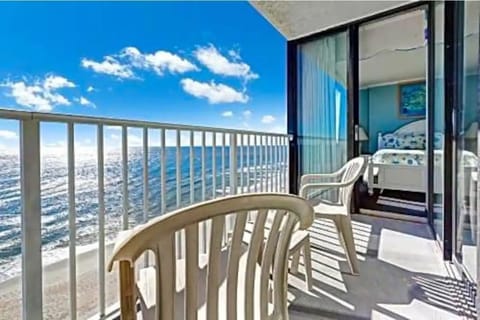 Beautiful ocean front condo (sleeps 6) just one story off the beach