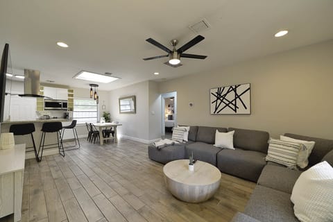 Unit 3. Living and dining area. Unit is 2 bedrooms and 2 bathrooms.