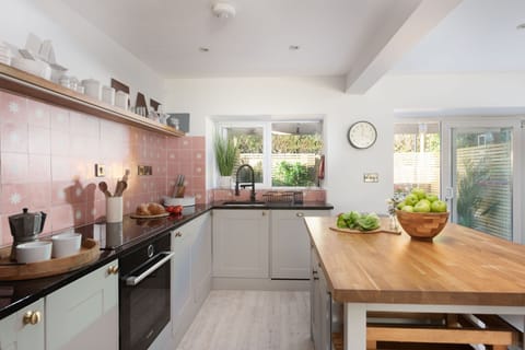 Maris Cottage, St Agnes. Ground floor: With an electric oven and hob, fridge/freezer and dishwasher