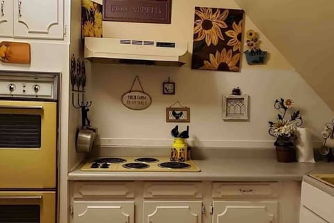Cute kitchen with everything you need to prepare and serve meals