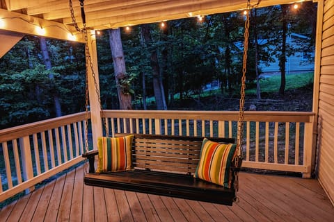 Bottom deck: a romantic escape on the porch swing! 